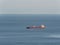 Empty oil tanker alone in the middle of calm ocean