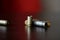 Empty old bullet cartridges on a dark background