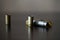 Empty old bullet cartridges on a dark background