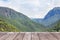 Empty old wooden balcony terrace on viewpoint high tropical mountain of rainforest