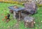 Empty old wooden table with chairs made of logs