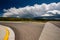 Empty open highway and stormy clouds in Wyoming