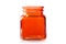 Empty orange glass jar