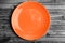 Empty orange plate