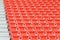 Empty orange seats at stadium,Rows walkway of seat on a soccer stadium