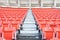 Empty orange seats at stadium,Rows walkway of seat on a soccer stadium