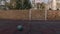 Empty outdoor mini football and basketball court