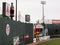 Empty outfield with ads on wall