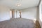 Empty pale grey room interior with carpet floor.