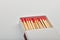 Empty paper matchbox with wooden matches on it. Matchbook case p