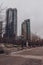 Empty park in downtown with benches and skyscrapers in Vancouver