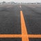 Empty Parking Lot with Orange Lines