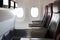 Empty passenger airplane seats in cabin. Interior in modern airplane..