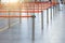 Empty paths bounded by a red ribbon to the check-in desks and baggage claim at the passenger airport terminal