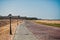 Empty paved public walkway at hotel resort