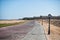 Empty paved public walkway at hotel resort