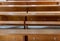 A empty pews in the church with hooks