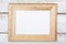 Empty photo frame, white table high angle view