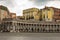 Empty piazza Plebiscite with colonnade in cloudy day. Naples landmark. Italian architecture.