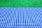 Empty Picnic Table With Blue White Tablecloth Background