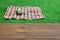 Empty Picnic Table Close-Up Blanket With Basket In The Background