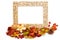 Empty picture frame with dried flowers and leaves