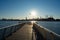 Empty Pier at Transmitter Park in Greenpoint Brooklyn New York over the East River with a view of the Manhattan Skyline before Sun