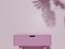 Empty pink table with soft pink wall and copy-space.  Display for woman cosmetic perfume fashion product. 3D rendering