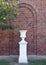 Empty planter on a pedestal outside Mount Auburn School in Dallas, Texas.