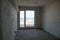 Empty plastered room with window renovation concept