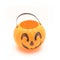 Empty plastic Halloween pumpkin pail basket on white