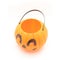 Empty plastic Halloween pumpkin pail basket on white