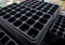 Empty plastic trays for growing young seedlings