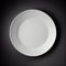 Empty plate on black, elegance in simplicity generated by AI