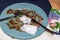 An empty plate with cutlery after dinner in a cafe, dirty dishes.