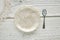 Empty plate dish with spoon food hungry concept