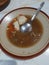 Empty plate after enjoying breakfast with rice cake noodles, popular food