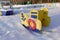 Empty playground for children on a frosty snowy winter day covered with snow without people. Russian playground. Maritime military