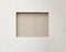 Empty recessed square space in a wall, for displaying or hanging art. Center focus space indoors with copy space. Light brown or