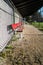 Empty red baseball dugout bench