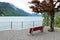 Empty red chair and landscape from Brienz town in Switzerland.