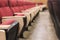 Empty red seats in lecture hall