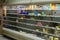 Empty refrigerated shelves at Publix featuring dairy food shortage including milk, yogurt, and sour cream, during Covid-19 corona