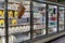 Empty refrigerated shelves at Publix featuring dairy food shortage including milk, yogurt, and sour cream, during Covid-19 corona