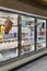 Empty refrigerated shelves at Publix featuring dairy food shortage including milk, yogurt, and sour cream, during Covid-19 corona