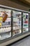 Empty refrigerated shelves at Publix featuring dairy food shortage including milk, yogurt, and sour cream, during Covid-19 corona