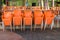 Empty restaurant or open-air cafe. Furniture for the summer bistro on the terrace among the green trees. The concept of a holiday