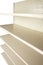 Empty retail store shelves at extreme angle