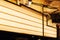 Empty retro theatre lightbox sign hang on the wall in warm yellow light