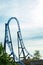 Empty ride roller coaster on sky background in amusement park